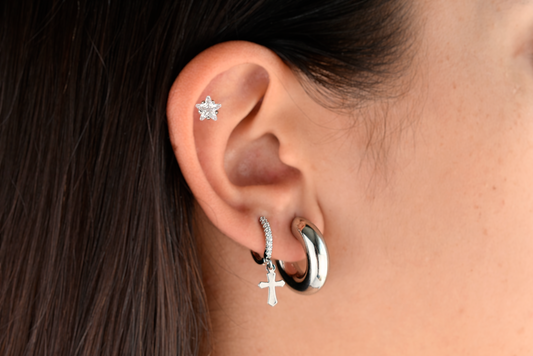 Cross hoop earring