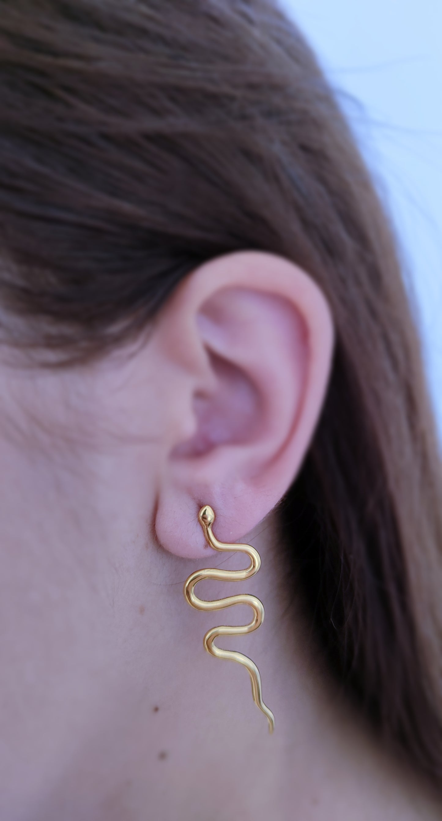 Pendientes dorados serpiente largos